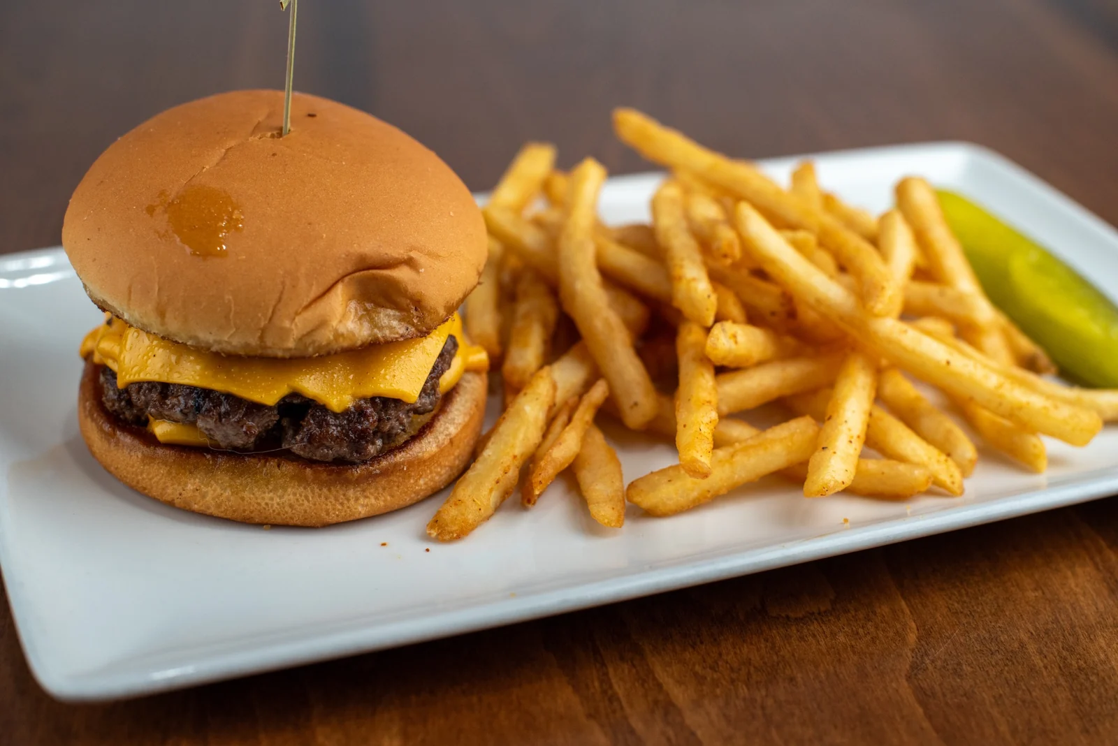 A Rewsters smash burger with golden fries